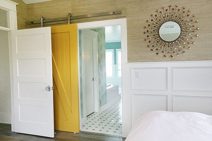 rustic barn door in bedroom